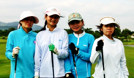 An all-Thai ladies team in confident mood heading for the first.