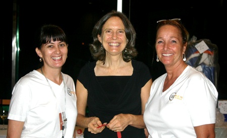 Mary Kelly, center, won the top raffle prize of a trip to the Anatara Si Kao Resort & Spa in Krabi.