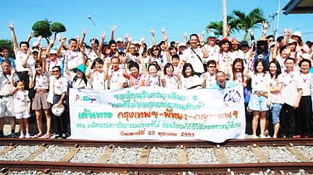 Chai yo! Passengers arrive in Pattaya happy after a train ride from Bangkok.