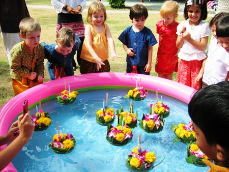 International School of Chonburi students release their krathongs in the school’s play pool.