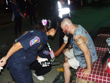 Emergency workers attend to the injured Finn.