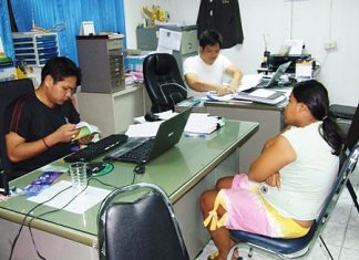 Under questioning from Col. Tanasit Kaenluem, the 6-months pregnant Urai Inphirom (seated, right) allegedly admitted meeting “Pinky” while working as a prostitute on Beach Road.