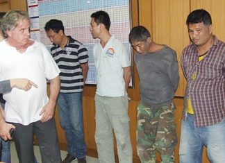 Svein Tore Holtekjolen (left) stares down the failed kidnappers.