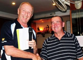 Sunday’s winner Lee Adelly, right, with the golf chairman.