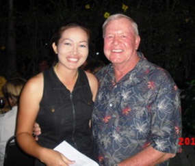 Ladies flight winner Jum Karagitt, left, accepts her award from the Golf Chairman.