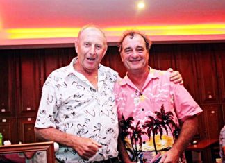 Brian Wilkinson, right, with Lewiinski’s golf manager, Colin.