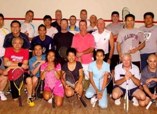 The two teams line up for a group photo at the Ambassador Hotel.