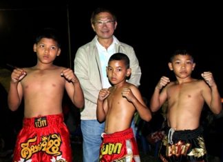The three young boxing stars strike a pose.