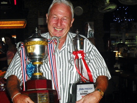 Gerry Cooney holds the John Preddy Memorial Trophy after a fine round of 44 points at Khao Kheow.