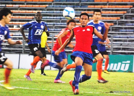 Pattaya United U-19’s (red shirts) take on Thai Port Authority U-19’s at the Pat Stadium in Bangkok on Thursday, Dec. 2. 