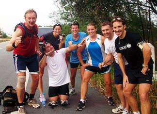 The Regents Runners team take time out from training to pose for a group photo.