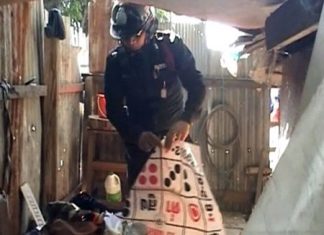 Police Descend on Gambling Den