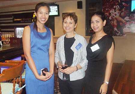 The Hilton’s Thitiporn Boonsuk poses for a photo with Dr. Lillian Fawcett and Unchalee (Ashlee) Chamnithurakr.