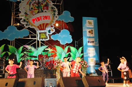 Children from the Father Ray Foundation perform for the audience.