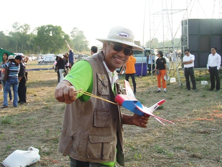 This guy is obviously having fun with his model airplane.