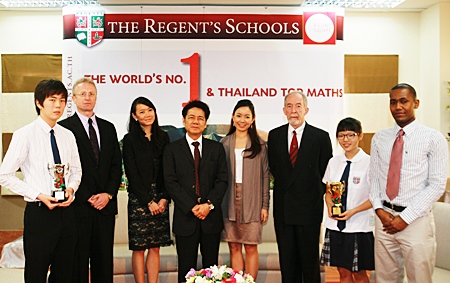 Regents School directors and the two outstanding students pose for a photo at the press conference. 