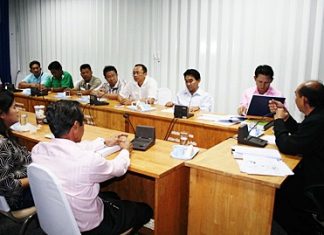 Maptaput-area residents discuss filing a petition to have authorities deny a permit to build a coal energy plant.