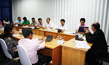 Maptaput-area residents discuss filing a petition to have authorities deny a permit to build a coal energy plant.