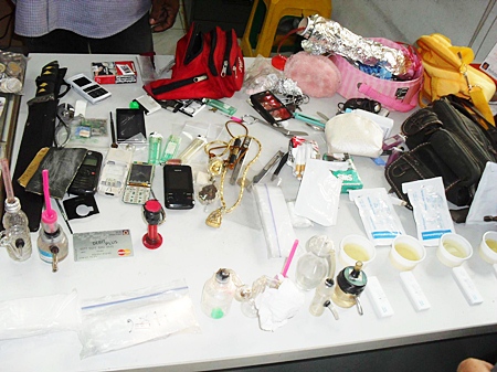 Investigators seized a pink Fino, 21 ya ba tablets, a small pack of marijuana, more than 51,000 baht in cash, gold necklace, mobile phone, knife and drug paraphernalia. 
