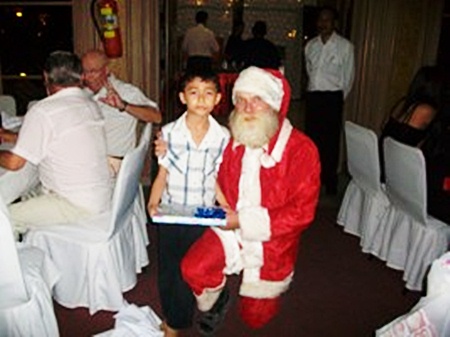 Santa doles out some early Yuletide gifts.