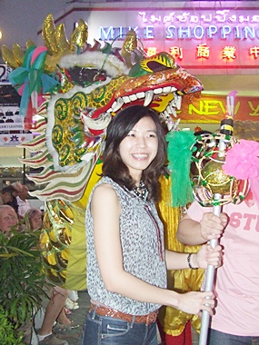 Feeding the dragon in front of Mike Shopping Mall.