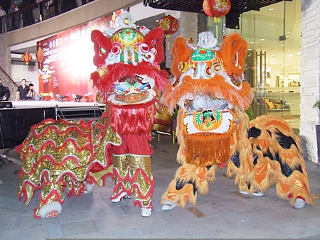 Traditional lion dancers perform at the Chinese New Year celebration announcement last week. 
