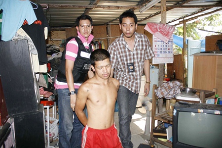 Police arrest Chonathee Jaiprayong at his Nong Prue home. 