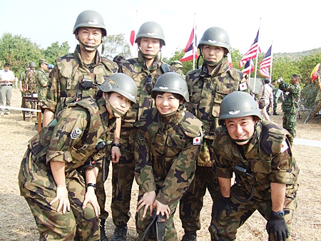 Japanese forces take time out for a commemorative photo during the Feb 12 evacuation drill.