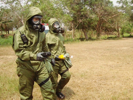 Troops re-enact the process of locating nuclear and biochemical substances in a battle situation. 