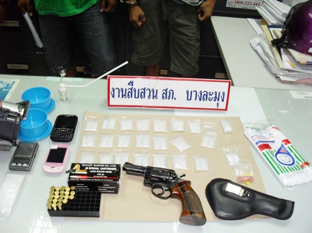 Police confiscated drugs, phones and weapons in the sweep of Rongpo neighborhood. 