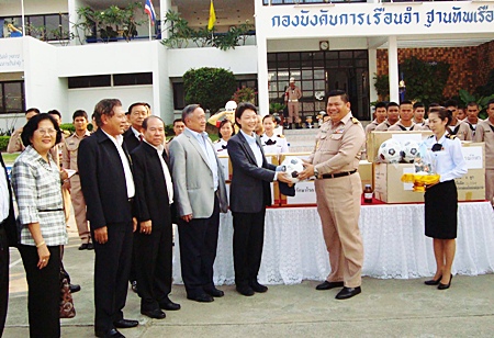 Ketsanee Khaewattanal (left center), chairwoman of the Senate Military Committee delivers medicine, medical supplies and sports equipment to Wiwat Polamuang School. 