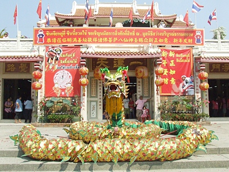 Pattaya denizens welcomed in the Year of the Rabbit last weekend with parades, lion and dragon dances, prayers, fireworks and a grand party.  The eclectic mix of the city and surrounding environs showed in the many different ways Chinese New Year was celebrated this year, including this dragon guarding the entrance to the Sawang Boriboon Foundation in Naklua. 