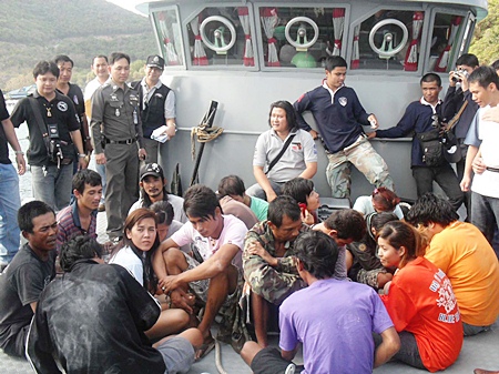 The drug suspects are taken back by boat to Pattaya for further questioning.