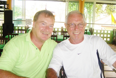 The previous week’s big winner, Tony Chetland, celebrates with Ken Hole, the winner at Greenwood this past week. 