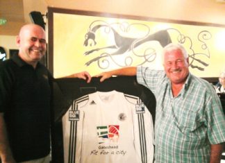 Stewart Fraser of Shenanigans Irish Bar in Jomtien, left, is seen with former Gateshead goalkeeper George Alberts, who lives in Thailand, with a backdrop of a framed Gateshead Football Club shirt brought over by Laurence Dinning one of the club’s sponsors. Gateshead, who are currently members of The National Conference league in England, are two games away from a Wembley appearance in The FA Trophy. George, who played under two managers at Gateshead in the 1960’s (former Newcastle winger Bobby Mitchell, and George Hardwick of England and Middlesbrough) was delighted with the presentation and remarked that another former Gateshead player Tom Callender, who played 432 games for Gateshead in the old 3rd Division (North), had once been described by the late Nat Lofthouse as one of the best centre half’s he had played against. Bolton beat Gateshead 1-0 in an FA Cup 6th round tie in 1953 on their way to the final against Blackpool.