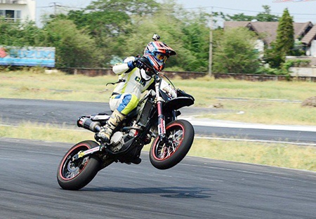 Ben Fortt races on his Husqvarna SMR 450cc motorbike.