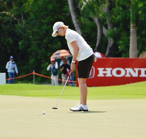 Carrie Webb putts for birdie on the short par-three 8th.