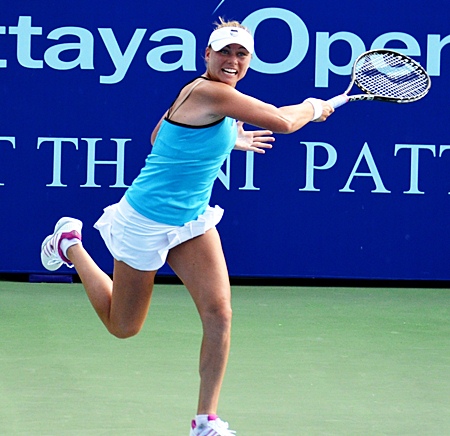 Vera Zvonareva unleashes a fierce forehand in her quarter-final match against China’s Shuai Peng.