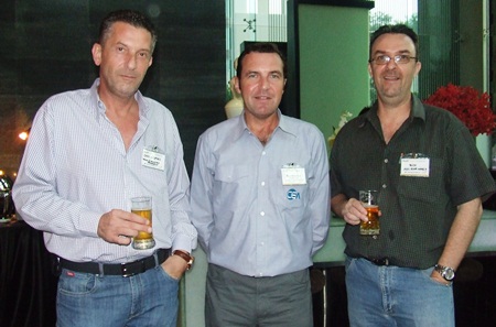 Cees Cuijpers (Town & Country Property), Paul Wilkinson (CEA, AustCham Eastern Seaboard Coordinator), and Nick Chomonter (AGS Four Winds) enjoy the first of many cocktails.