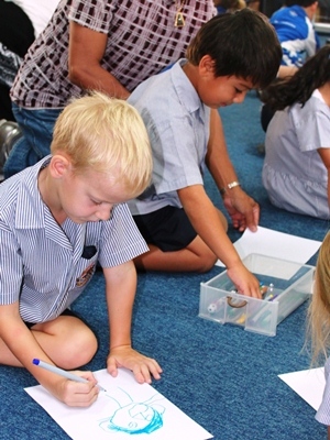 The children get involved and draw their own book characters