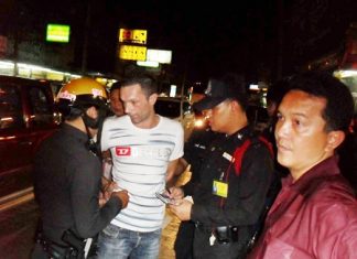 Sebastian Guillaume is arrested at a checkpoint on Pratamnak Road in Jomtien Beach.