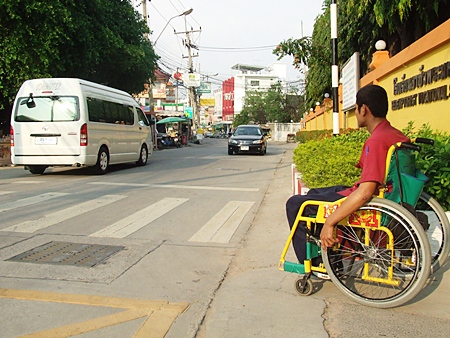 Students with disabilities sometimes have a tough time in front of the school, as they need to wait for kind drivers to allow them to cross the road.