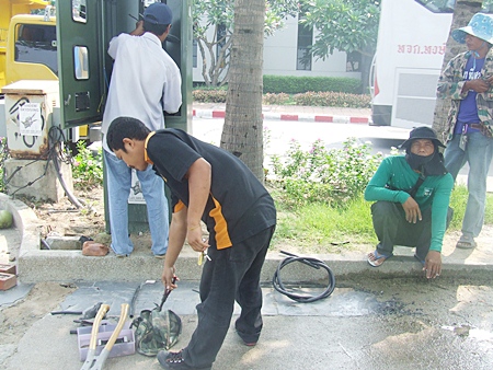 Workers repair the city’s CCTV cameras along Beach Road ahead of last week’s music festival.