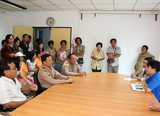 Royal Thai Marines Lt. Col. Pramot Sri-Ondee and angry residents complain to Village Chief Natthachai Sangsri about local water supply problems.