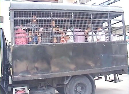 The illegal aliens are driven away by Pattaya immigration police.