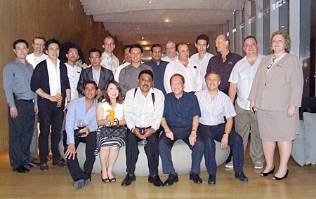 The hotel GMs and other invited guests pose for a group photo at the Hilton Pattaya.