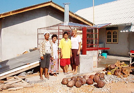 Pat with 3 Thai tsunami survivors whose small medicinal herb business had been totally destroyed in the tsunami.