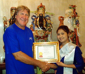 Rosco receives his hole in one certificate at the Porn Ping Hotel.