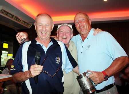 Monthly medal winner Jez Lees, left, celebrates his win with Colin the Golf Manager, right and the scribe, center. 
