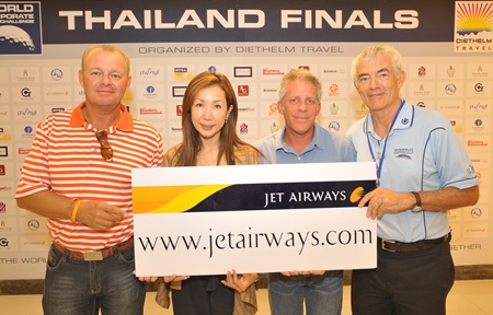 Kenth Fredin, left, of Team Inzentive collects the top prize at the World Corporate Golf Challenge Thailand finals.
